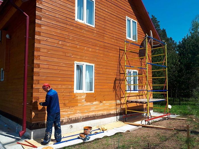 покраска дома из бруса цена